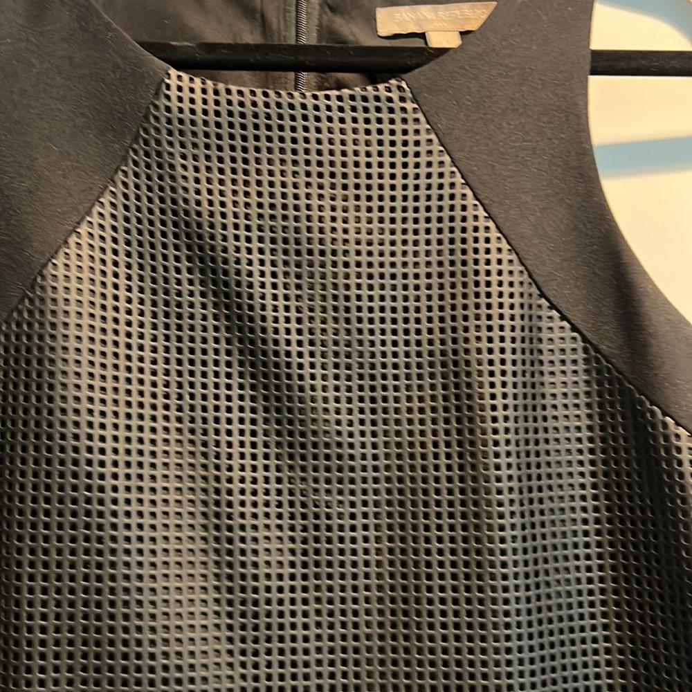 Black short dress with faux leather detail